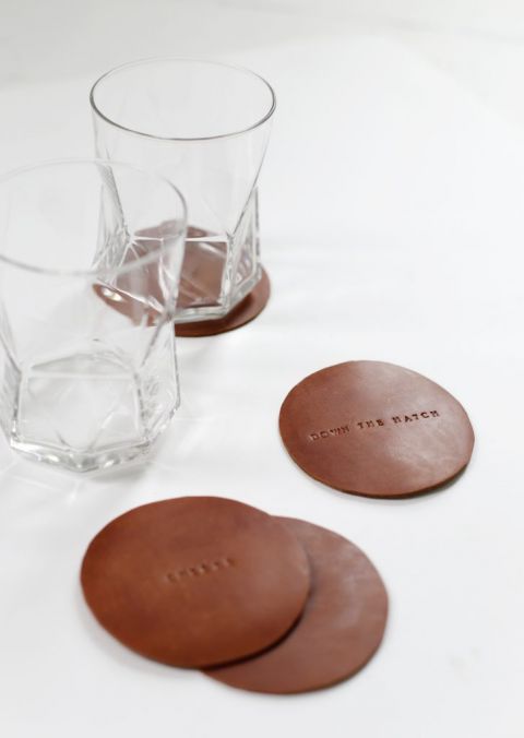 leather stamped coasters with rocks glasses