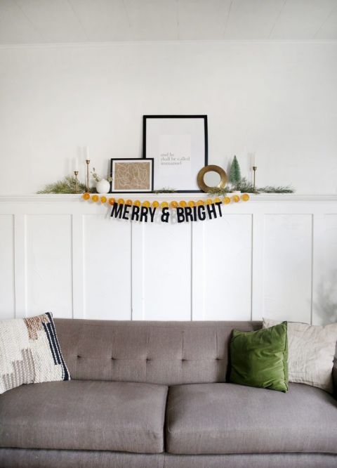 holiday decor above grey couch