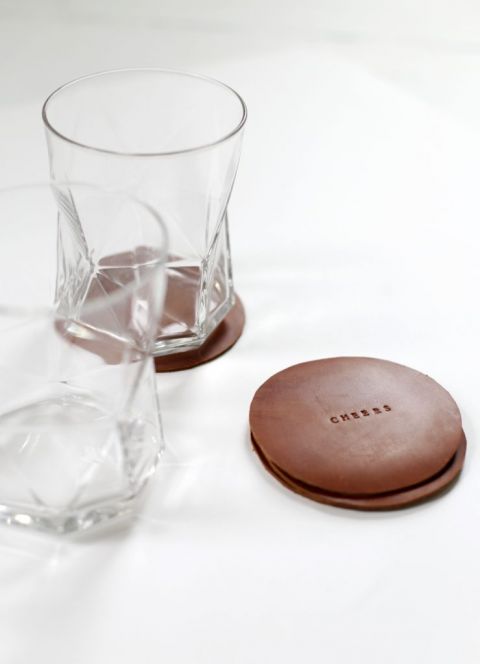 leather stamped coasters with rocks glasses
