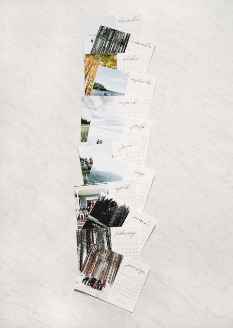 photo calendar pages arranged on desktop