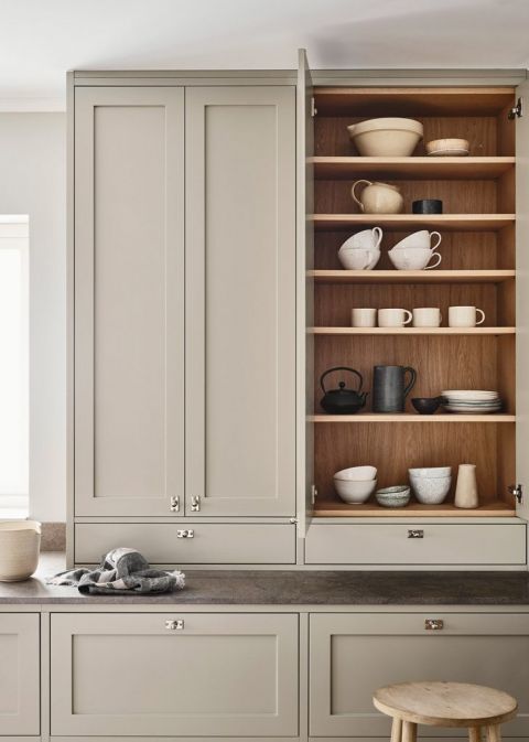 kitchen cabinets with doors open on one set of cabinets