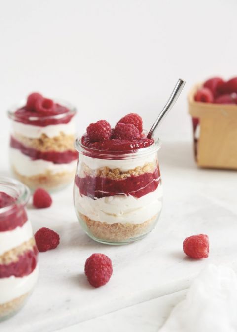 jar of layered no bake raspberry cheesecake parfait