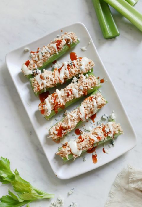 overhead shot of buffalo chicken celery on a platter
