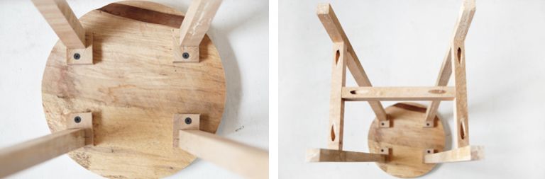 under side of wood stool with screws and screws showing