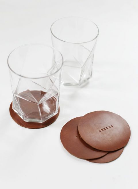 leather stamped coasters with rocks glasses