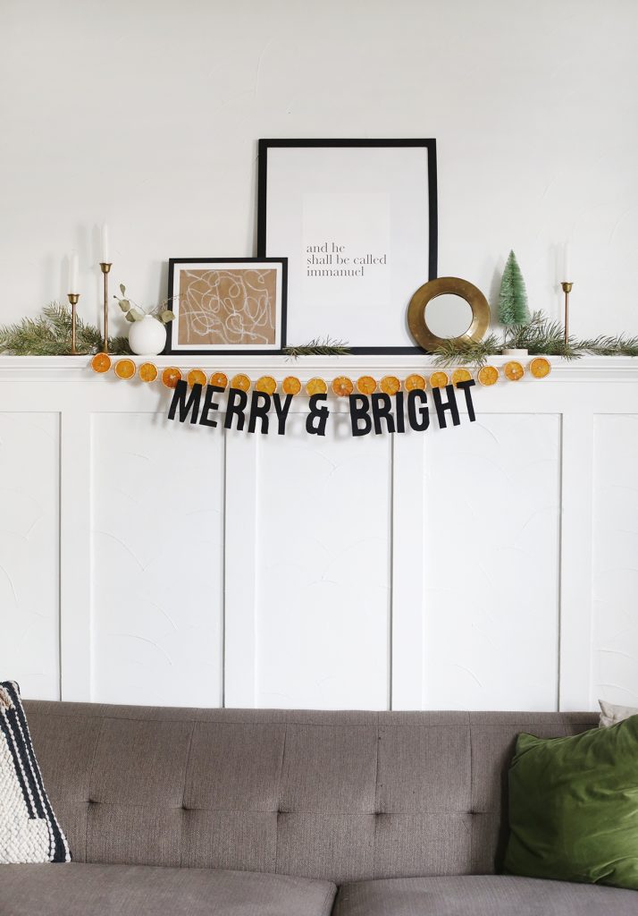 holiday garland with frames and decor