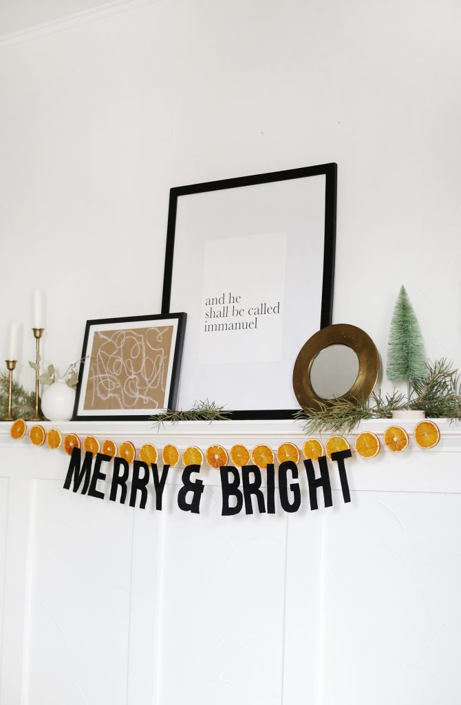 holiday garland with frames and decor