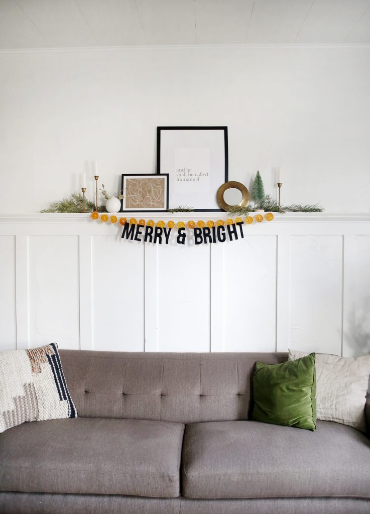 holiday decor above grey couch