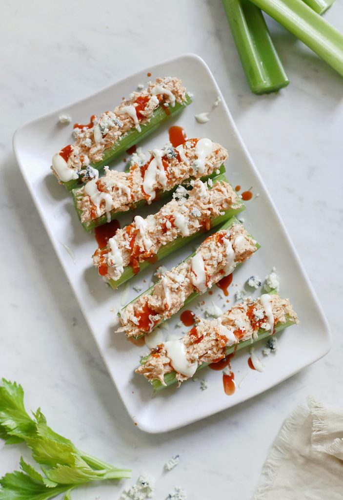 overhead shot of buffalo chicken celery on a platter