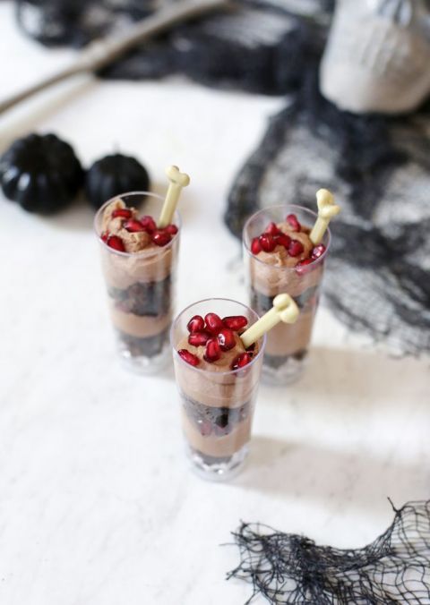 dessert shooters surrounded by halloween decor