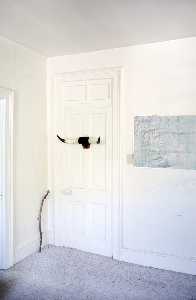 blank room with map on wall