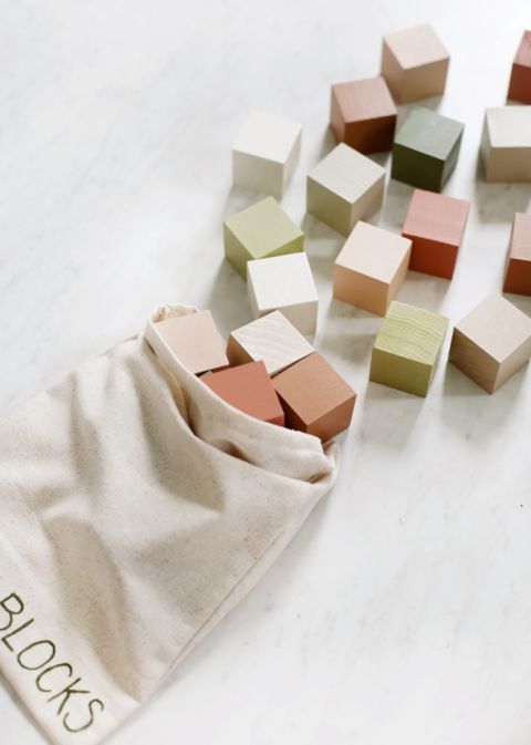 overhead shot of cotton bag with diy wooden blocks coming out