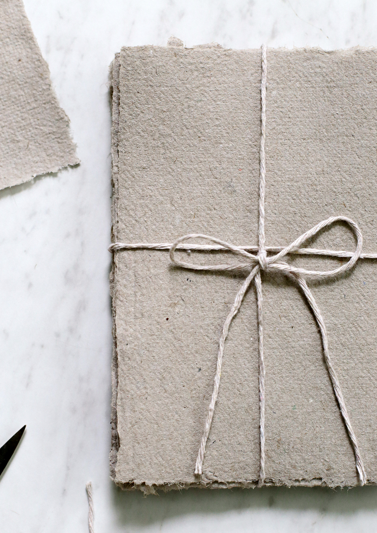 close up of tied bundle of recycled papers