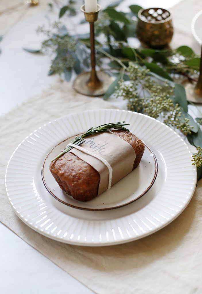 mini banana bread loaf on cream plates