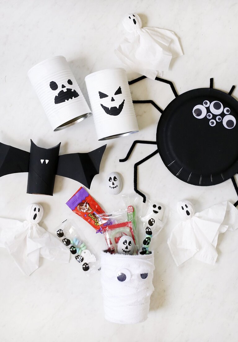 halloween kid crafts laid out on counter