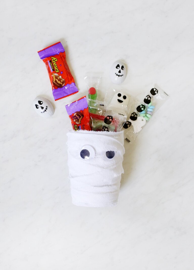 mummy candy cup with candy spilling out