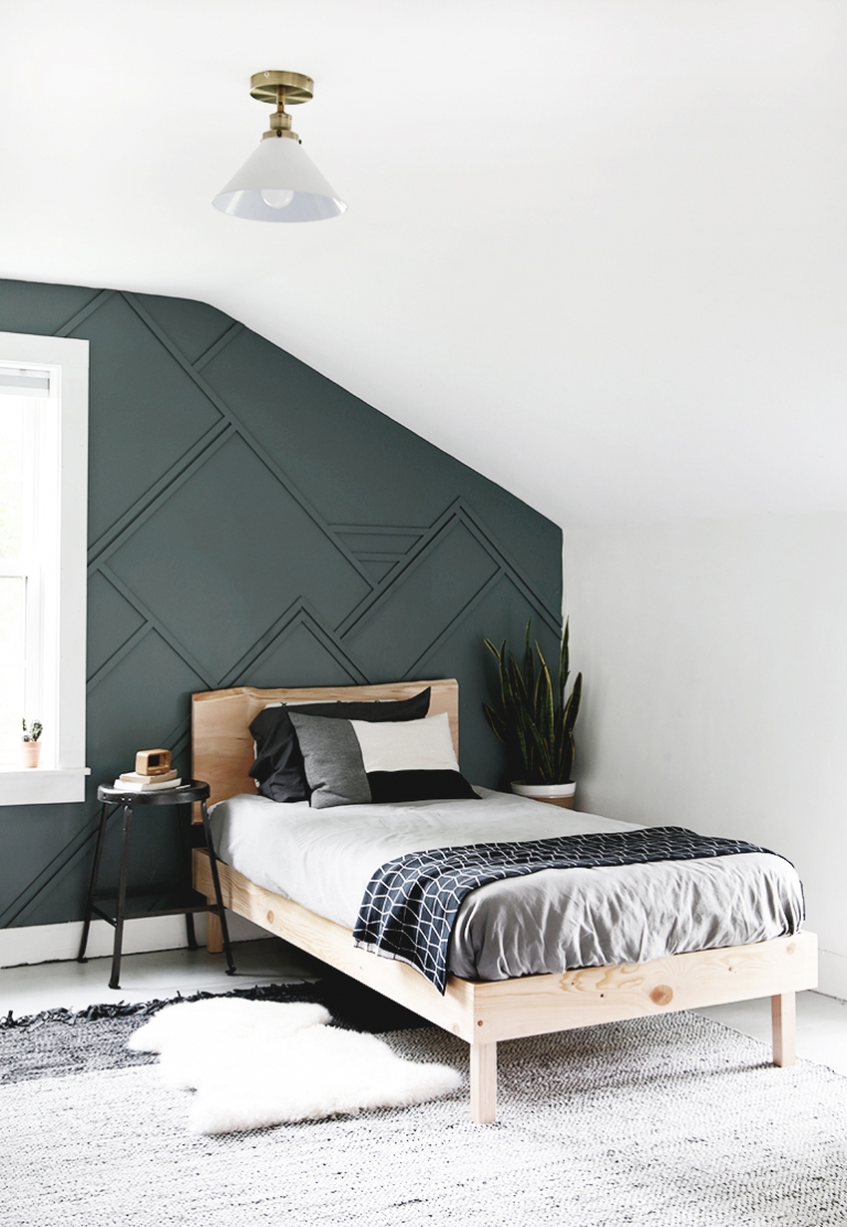 bedroom with bed and blue wall