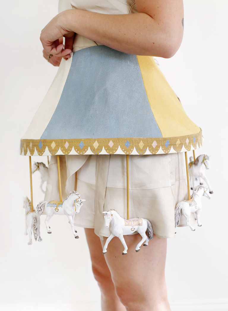 close of of costume with vintage horses