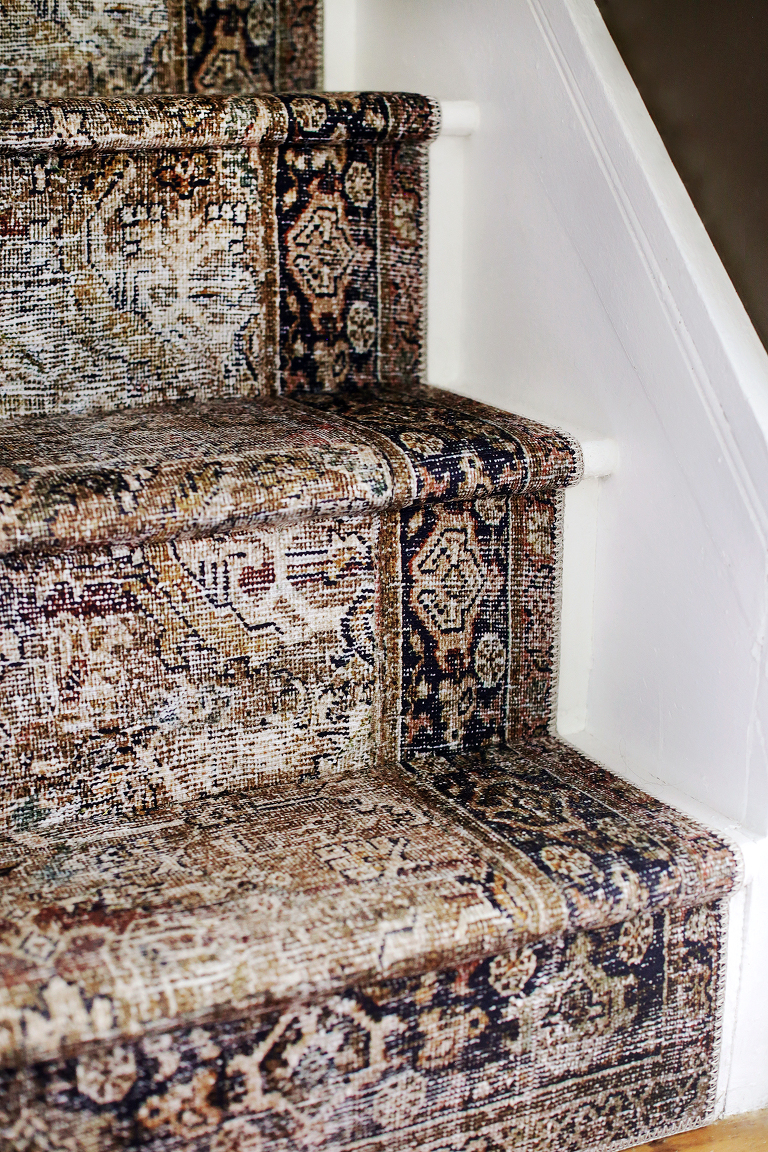 vintage style carpet stair runner on white stairs