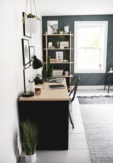room with desk and wood shelves