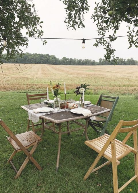 table set up outdoors by field 