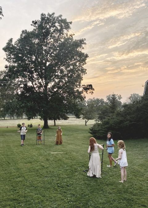 group of young kids playing yard games