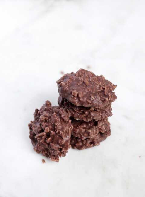 stack of chocolate coconut clusters on marble
