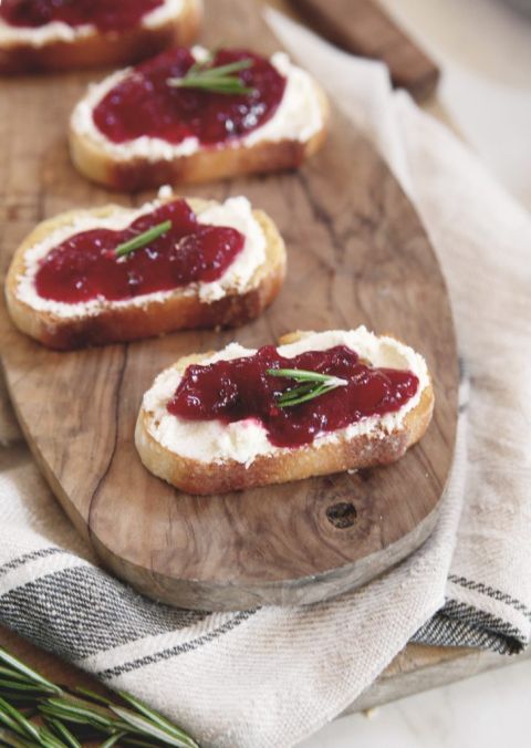 close up of cranberry whipped feta crostini appetizer
