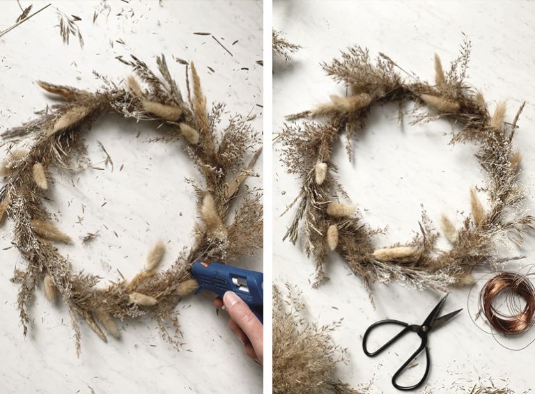 dried grass wreath with hot glue gun and scissors