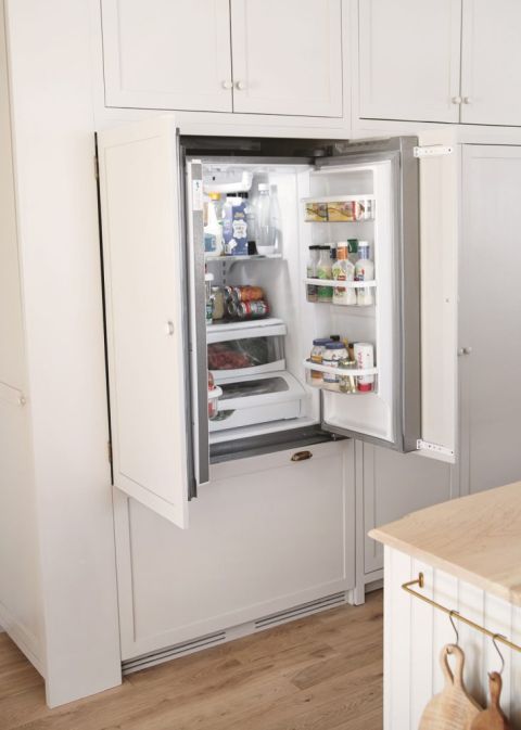 beige panel french door refrigerator with both doors open
