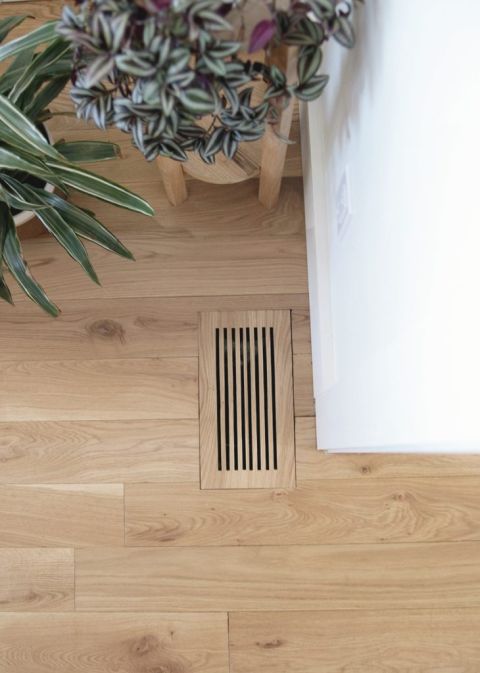 wood vent cover near plants