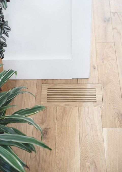 wood air vent cover with plants
