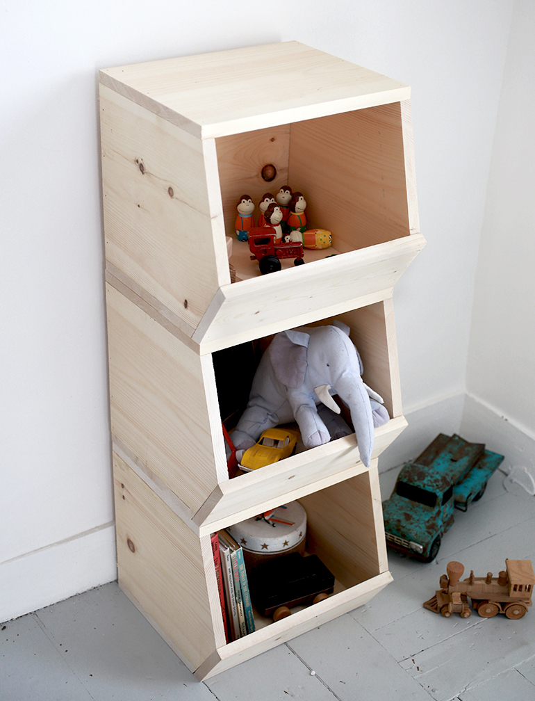 wooden toy shelf with bins