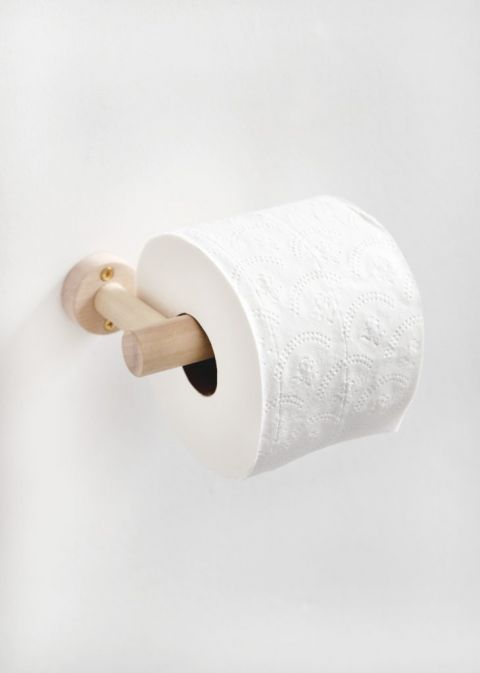 roll of toilet paper on wood dowel toilet paper holder