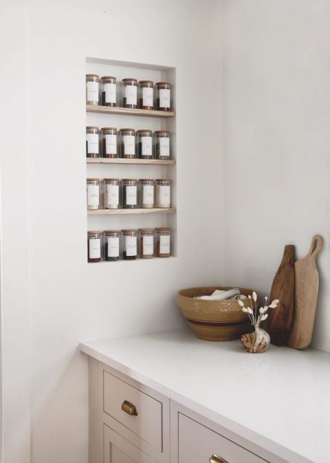 kitchen with built in spice jar shelves