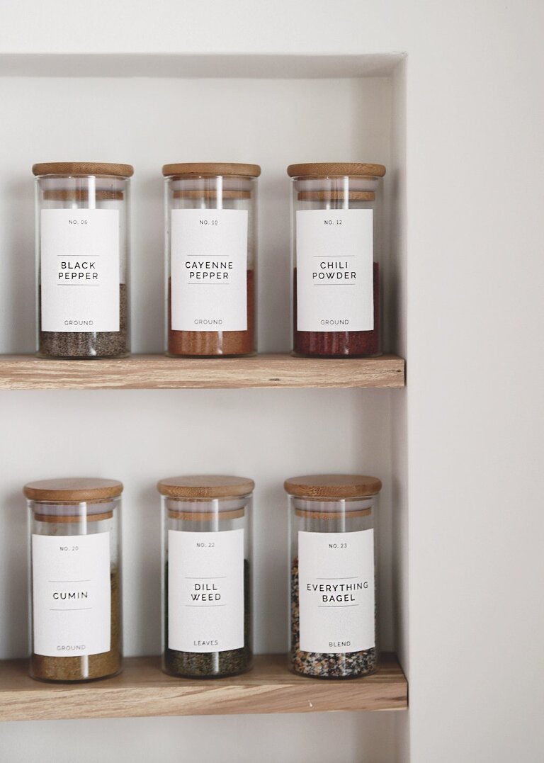 spice jars on shelf in kitchen