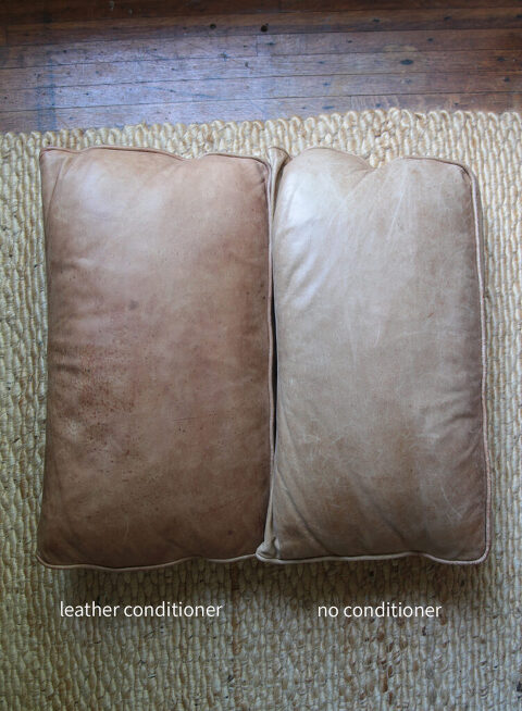 two leather hovel cushions laying on the floor next to each other, one darker than the other