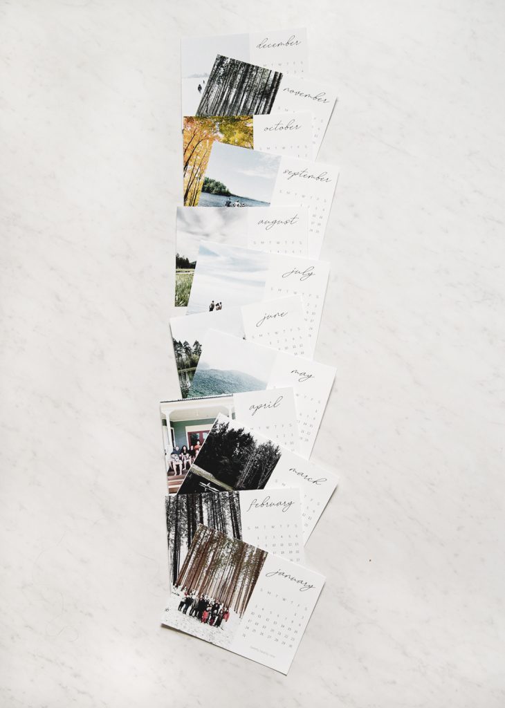 photo calendar pages arranged on desktop
